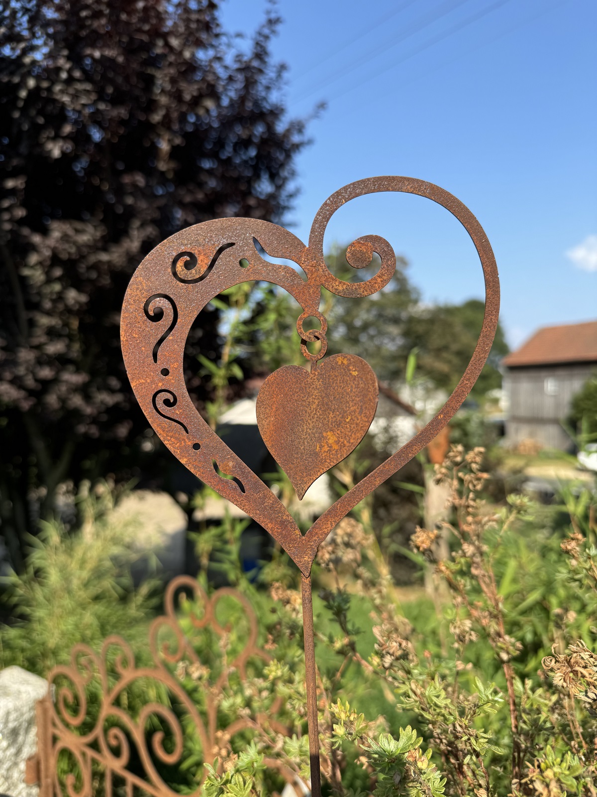 Edelrost Herz Ornament klein mit beweglichem Innenherz - Höhe 60 cm